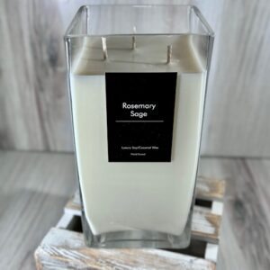 Soy and coconut wax blend candle in a tall square glass container